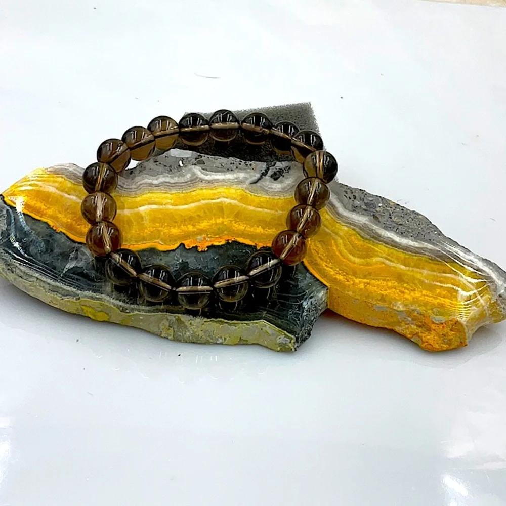 Vtg 7”Stretchable Smokey Quartz Bracelet (1988) - Picture 2 of 7
